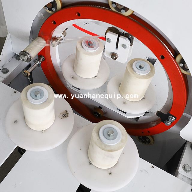 Máquina para envolver bobinas de cable con film estirable